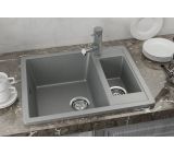 Two-section sink with tap hole